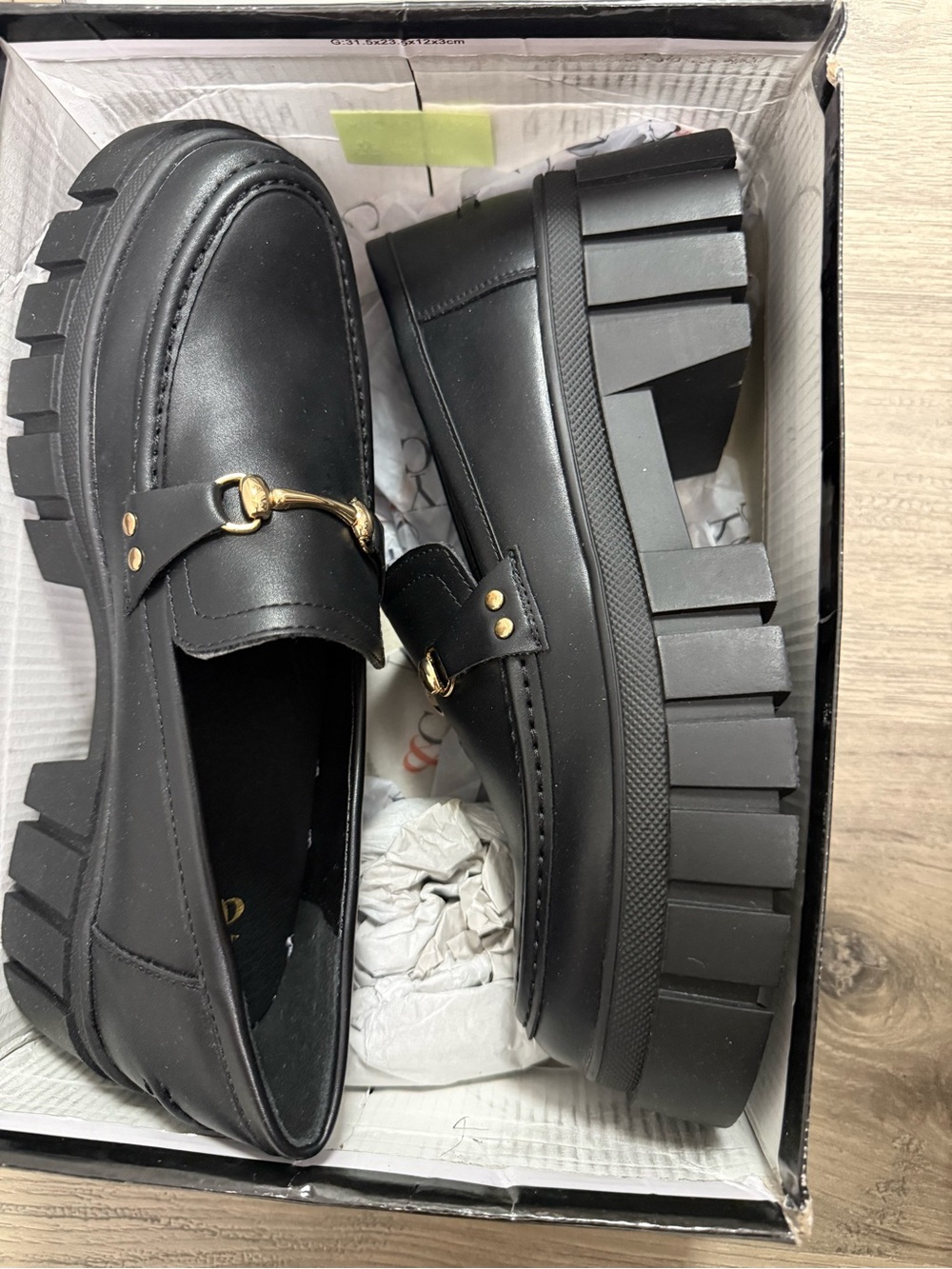 New York and Company Seraphina Black Chunky Lug Sole Loafer with Gold Accent